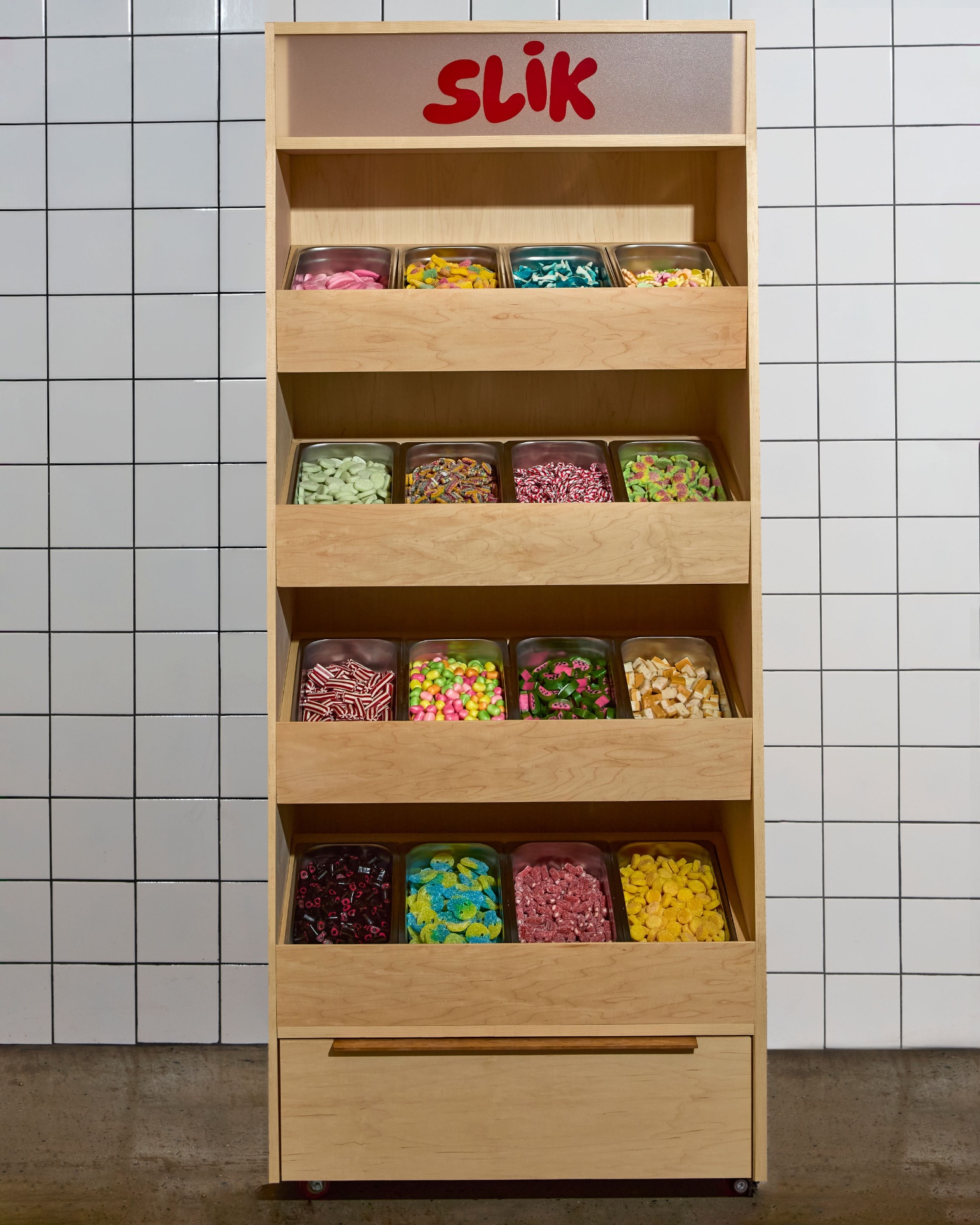 SLIK pick-and-mix candy cart filled with assorted sweets
